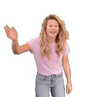 Girl waving then pointing down
