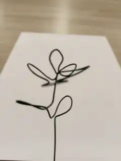 Continuous line drawing of a flower