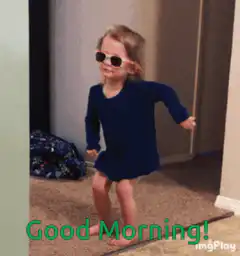 Toddler dancing in sunglasses