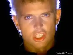 David Bowie singing with glowing hair