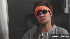 Adam Levine singing with sunglasses