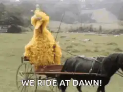 Big Bird rides a horse-drawn carriage