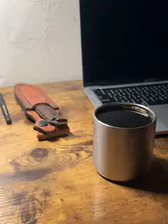 knife and coffee on desk