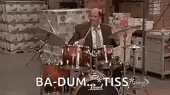Man playing drums with ba-dum-tiss text