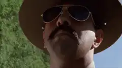Man in hat and sunglasses says mother of god