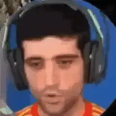 Man in headphones eyes widen then smile