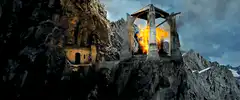 Stone tower on cliff burning