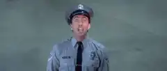Officer screaming with vampire fangs