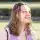 Woman smiling outdoors