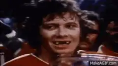 Michael J. Fox laughing with missing teeth