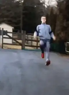 Man running with high kicks