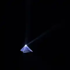 Glowing pyramid with light beams