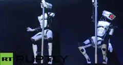 Two robots pole dancing