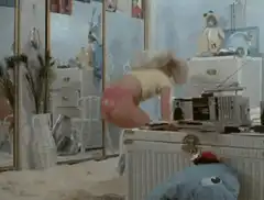 Woman does a backflip onto a rug