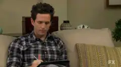 Andy shows off his drawing