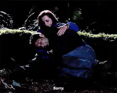 Woman apologizing to man in forest