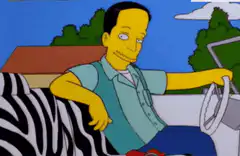 Lenny driving with a rocket
