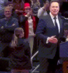 Elon Musk dancing at event