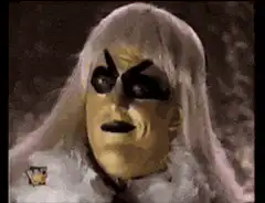 Gold face wrestler singing