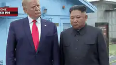 Trump and Kim Jong Un shake hands