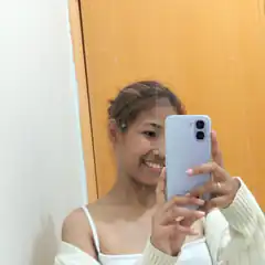 woman smiling selfie in mirror