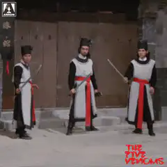 Two men fight while guards watch