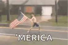 Shirtless man running with American flag