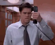 Jim Carrey screaming into a phone