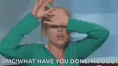 Woman in green shirt screaming OMG