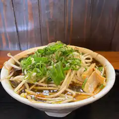 Bowl of ramen with green onions and bean sprouts