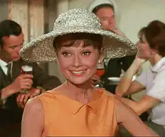 Audrey Hepburn waving in Breakfast at Tiffany's