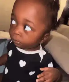 Baby looking around with big eyes