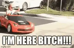 Toddler in toy car I'm here bitch