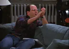 George Costanza praying on couch