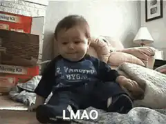 Baby falls over and laughs