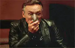 Dennis Hopper drinking from a glass