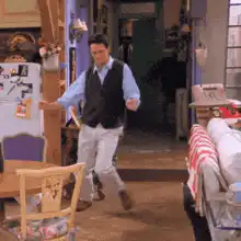 Chandler Bing running in apartment