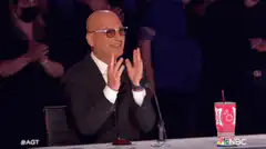 Howie Mandel clapping and praying