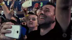 Man crying tears of joy at concert