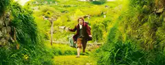 Bilbo Baggins running through the Shire