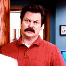 Ron Swanson squinting and nodding