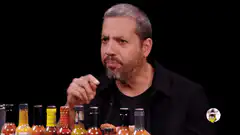 Man gives ok sign after tasting hot sauce