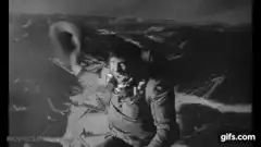 Man riding a bomb dropping