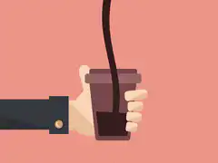 Hand holding coffee cup with liquid pouring