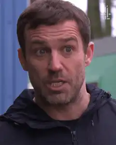 Man looks shocked and walks away