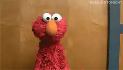 Elmo shrugging