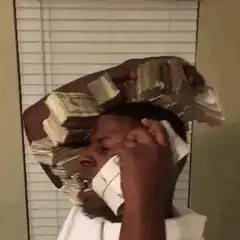 Man holding stacks of money