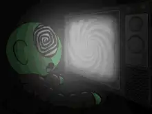 Green character hypnotized by TV