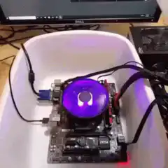 water poured on computer fan