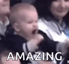 Baby cheering with fist pump